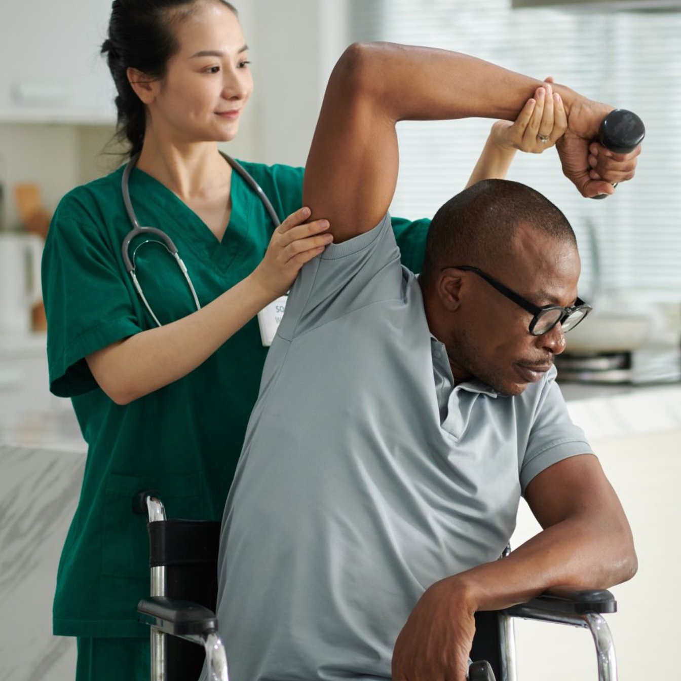 physical therapist working with a patient